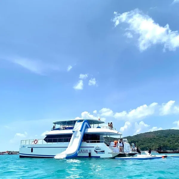 Water slide set up on a Koh Samui private boat rental power speed catamaran