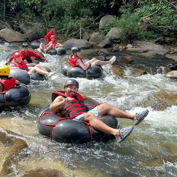 A group river tubing during the Phuket Khao Lak Kapong Tubing Waterfall Jungle Trekking Tour