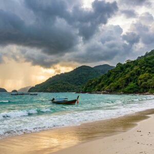 Empty Phuket beach during low season rainy season travel with dramatic clouds and lush green hills