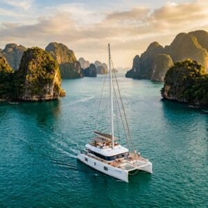 Luxury catamaran sailing through Phang Nga Bay as part of a bespoke Thailand itinerary planning experience
