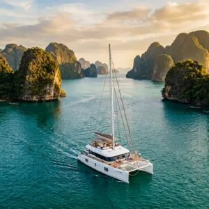 Luxury catamaran sailing through Phang Nga Bay as part of a bespoke Thailand itinerary planning experience
